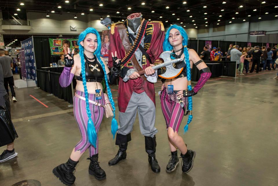 Emma Craddock, the Headless Horseman and Ollie Vatter at the Cincinnati Comic Expo in 2022.