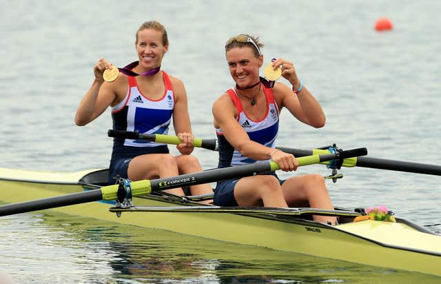 Helen Glover (left) and Heather Stanning celebrate winning gold