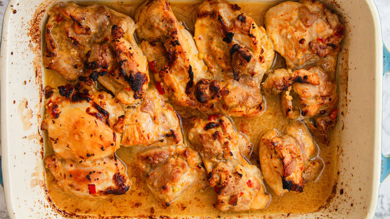 Broiled chicken in baking dish