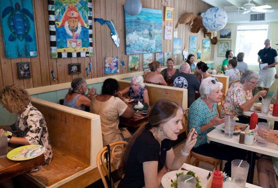 Duke's Lazy Loggerhead Cafe is filled with customers having lunch in Jupiter, Florida on August 10, 2022. 