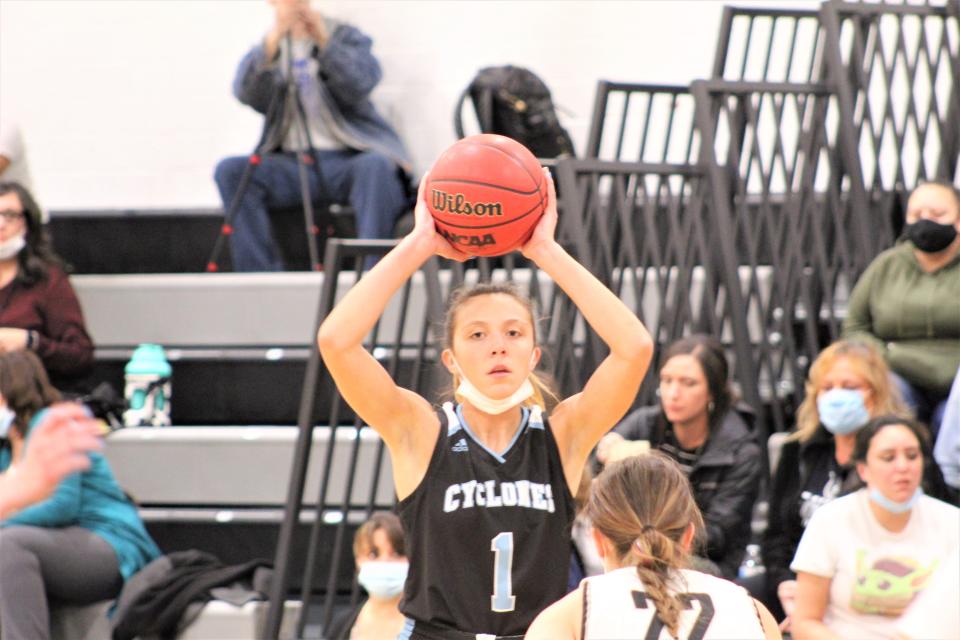 Gabby Louther scans the court for a pass in a game against the South Colts on Jan. 24, 2022