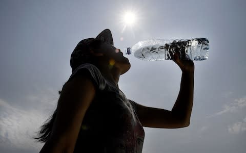 Water companies have been handing out bottles of water as supplies dry up - Credit:  FRED TANNEAU AFP