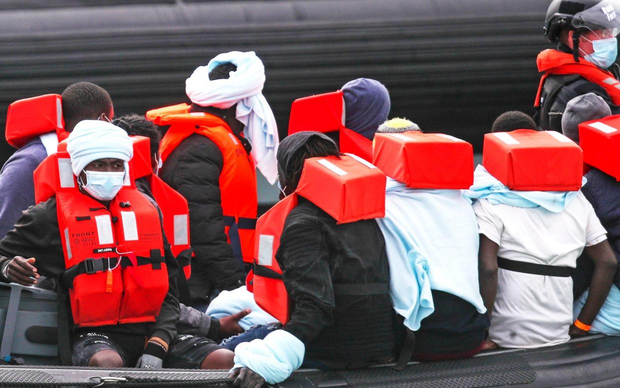 PABest A group of people thought to be migrants are brought into Dover, Kent, by Border Force officers following a small boat incident in the Channel. PA Photo. Picture date: Tuesday September 1, 2020. See PA story POLITICS Migrants.  - Steve Parsons/PA Wire