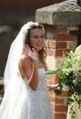 <p>The bride, Daisy Jenks, heading into the church.</p>