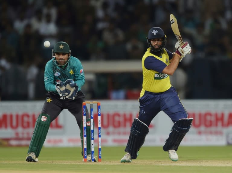 World XI batsman Hashim Amla (R) plays a shot on September 13, 2017