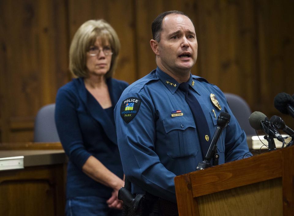 FILE - In this undated file photo, Woodland Park Police Chief Miles De Young answers questions about the disappearance of resident Kelsey Berreth, 29, while her mother, Cheryl Berreth, stands in the background during a news conference at City Hall in Woodland Park, Colo. Kelsey Berreth's disappearance has mystified her family and the Colorado police leading a multi-state search for the missing mother of a one-year-old daughter. Berreth was last spotted on Thanksgiving, Nov. 22, 2018, when a surveillance camera recorded the 29-year-old woman entering a grocery store near her Colorado home. (Christian Murdock/The Gazette via AP, File)