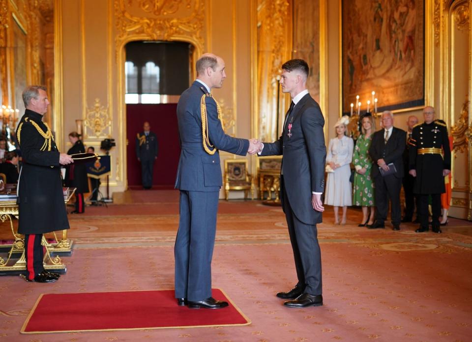 Ben Francis was made a Member of the Order of the British Empire by the Prince of Wales at Windsor Castle (PA)