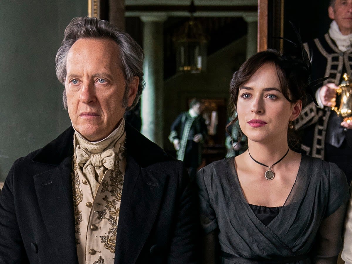 Miserable: Richard E Grant and Dakota Johnson in Netflix’s ‘Persuasion’  (Nick Wall/Netflix)