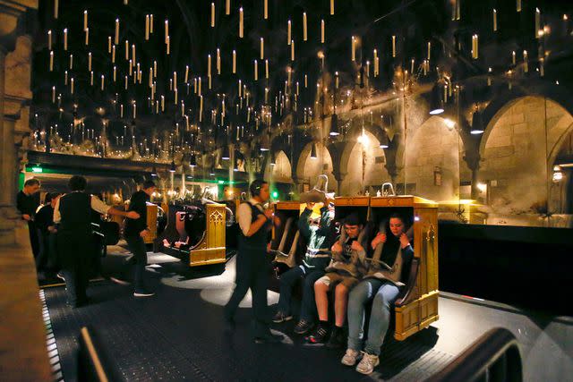<p>Mark Boster / Los Angeles Times</p> Candlesticks float and hover above the riders aboard Harry Potter and The Forbidden Journey in the new Wizarding World of Harry Potter At Universal Studios Hollywood.