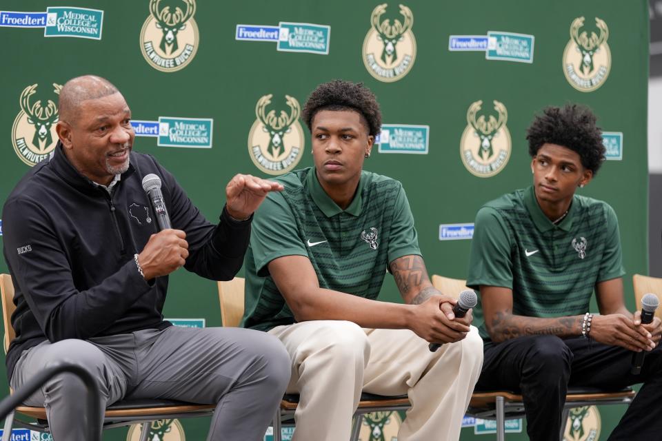 Milwaukee Bucks 2024 draft picks AJ Johnson and Tyler Smith listen to head coach Doc Rivers at a news conference Tuesday, July 2, 2024, in Milwaukee. (AP Photo/Morry Gash)