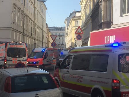Ambulances are seen near the site of a partial building collapse in Vienna