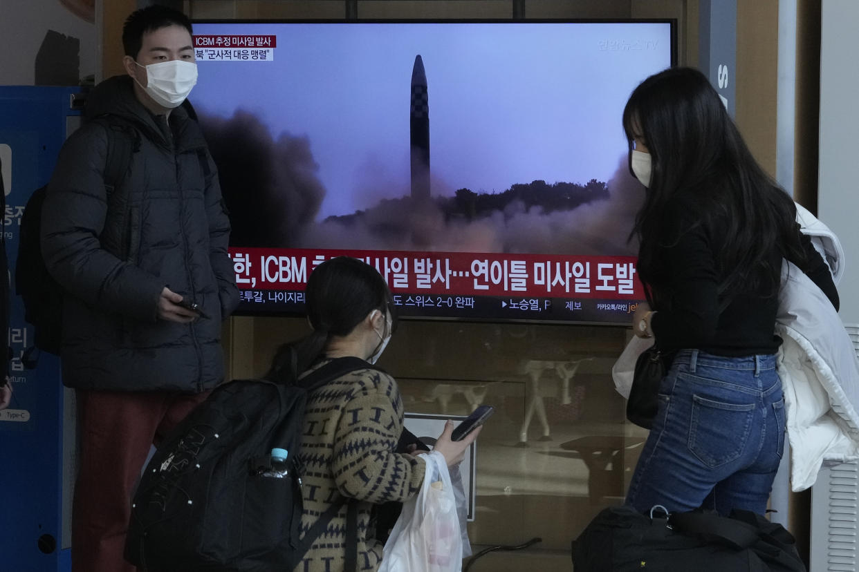 A TV screen shows a file image of North Korea&#39;s missile launch during a news program at the Seoul Railway Station in Seoul, South Korea, Friday, Nov. 18, 2022. (AP Photo/Ahn Young-joon)