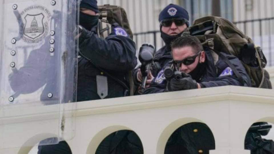 Law enforcement at the Capitol Building during the "Stop the "Steal" riot on January 6, 2021.