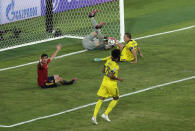 Sweden's goalkeeper Robin Olsen saves a ball during the Euro 2020 soccer championship group E soccer match between Spain and Sweden, at La Cartuja stadium in Seville, Spain, Monday, June 14, 2021. (Julio Munoz/Pool via AP)