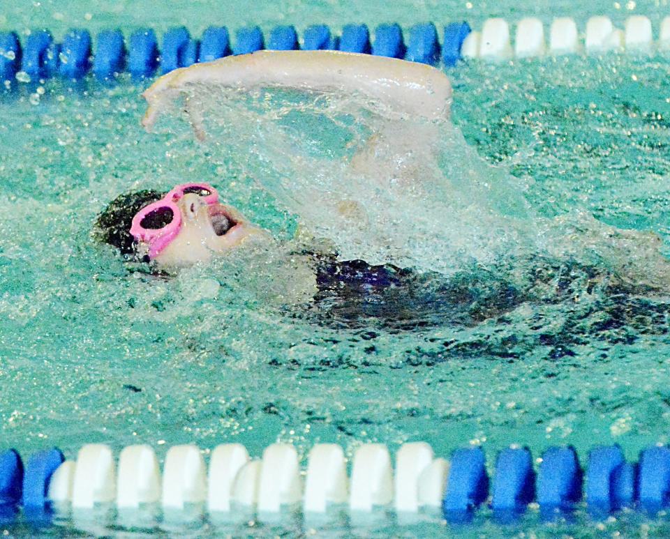 Paivi Brewster of the Watertown Area Swim Club is shown during the mixed 8-and-under 25-yard freestyle over the weekend in the Optimist High Point Swim Meet at the Prairie Lakes Wellness Center.