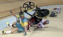 2016 Rio Olympics - Cycling Track - Final - Men's Omnium 40km Points Race - Rio Olympic Velodrome - Rio de Janeiro, Brazil - 15/08/2016. Glenn O'Shea (AUS) of Australia, Elia Viviani (ITA) of Italy and Park Sang-hoon (KOR) of South Korea crash. REUTERS/Eric Gaillard