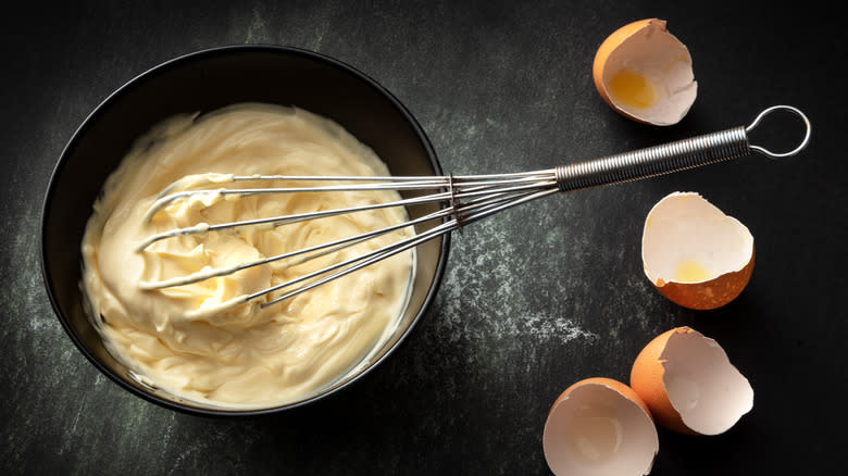 mayo, whisk, and empty egg shells