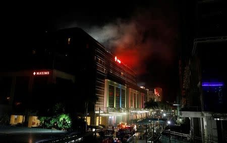 Smoke billows from the Resorts World building in Pasay City, Metro Manila, Philippines June 2, 2017. REUTERS/Erik De Castro