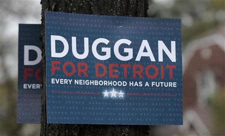 A campaign sign for mayoral candidate Mike Duggan is seen attached to a tree in Detroit, Michigan November 2, 2013. REUTERS/Rebecca Cook