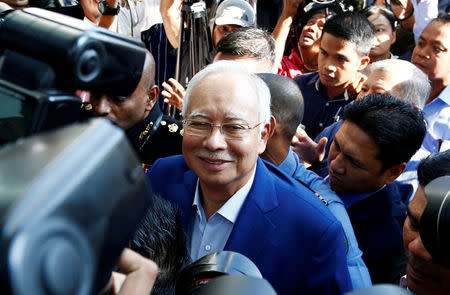 Malaysia's former prime minister Najib Razak arrives to give a statement to the Malaysian Anti-Corruption Commission (MACC) in Putrajaya, Malaysia. REUTERS/Lai Seng Sin