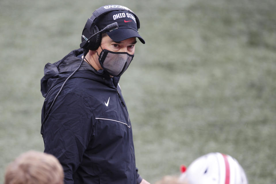 Ohio State head coach Ryan Day talks to his players during an NCAA college football game against Indiana, Saturday, Nov. 21, 2020, in Columbus, Ohio. (AP Photo/Jay LaPrete)