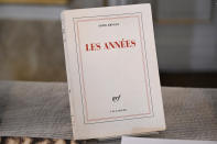The book “The Years” (Les annees), published in 2008, by French author Annie Ernaux is displayed during the announcement of the 2022 Nobel Prize in Literature, in Borshuset, Stockholm, Sweden, Thursday, Oct. 6, 2022. The 2022 Nobel Prize in literature was awarded to French author Annie Ernaux, for “the courage and clinical acuity with which she uncovers the roots, estrangements and collective restraints of personal memory,” the Nobel committee said. (Henrik Montgomery/TT News Agency via AP)