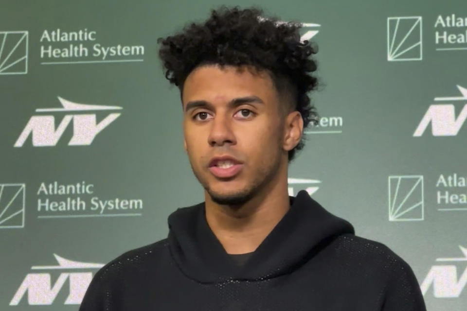 New York Jets quarterback Jordan Travis speaks to reporters during the team's rookie minicamp in Florham Park, N.J., on Saturday, May 4, 2024. (AP Photo/Dennis Waszak Jr.)