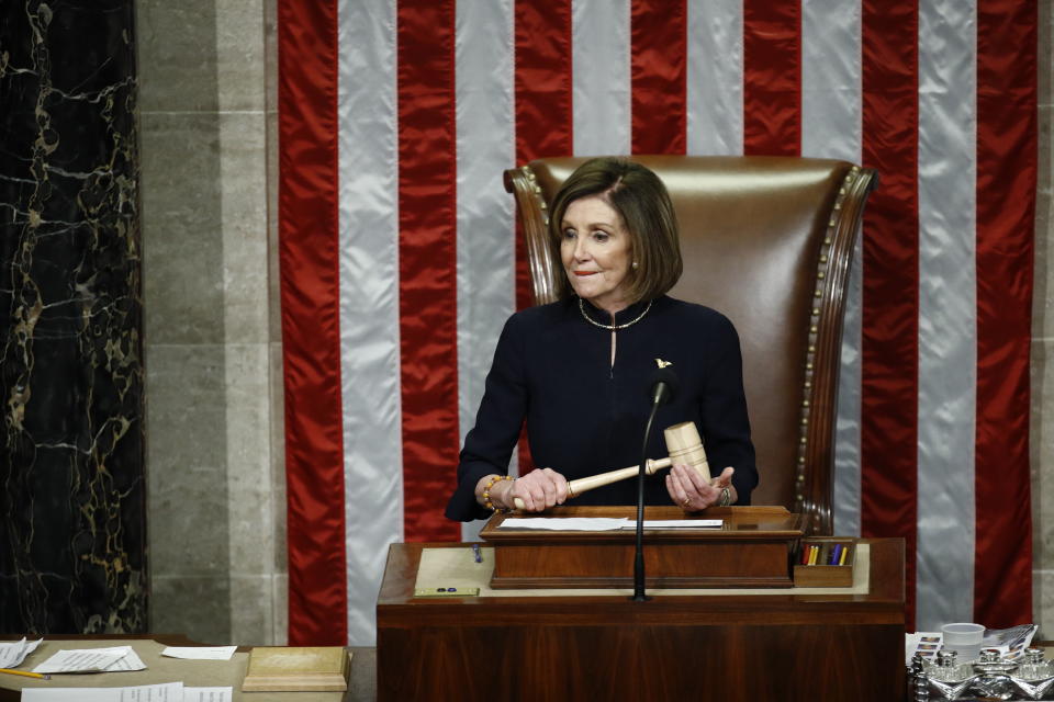 House Speaker Nancy Pelosi of Calif., holds the gavel as House members vote on the article II of impeachment against President Donald Trump, Wednesday, Dec. 18, 2019, on Capitol Hill in Washington. (AP Photo/Patrick Semansky)