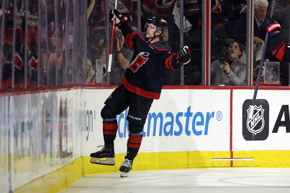 Carolina Hurricanes' Jack Drury (18) celebrates his game winning goal against the New York Islanders during the third period in Game 5 of an NHL hockey Stanley Cup first-round playoff series in Raleigh, N.C., Tuesday, April 30, 2024. (AP Photo/Karl B DeBlaker)