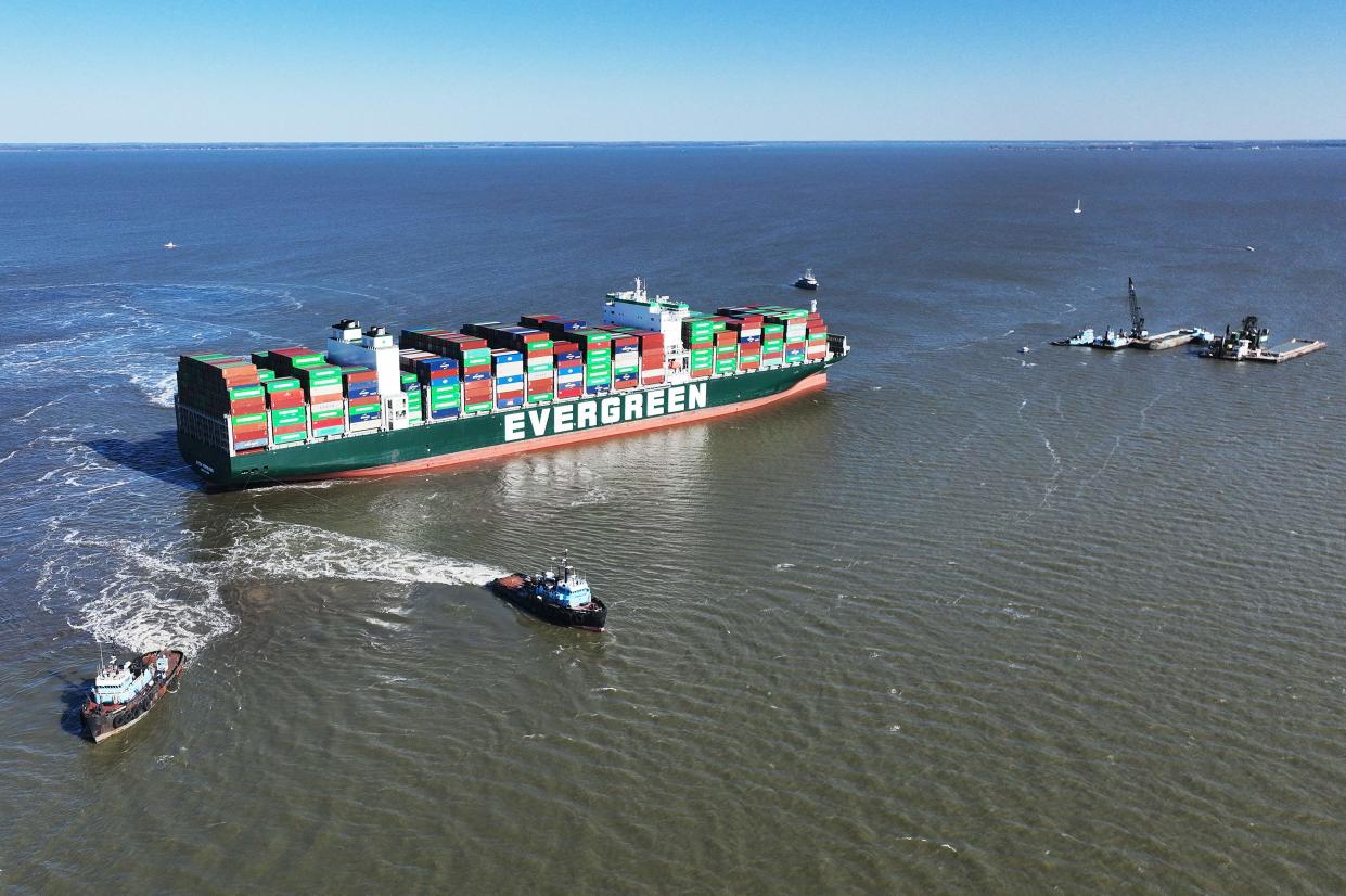Tugboats pull on the Evergreen container ship in Pasadena, Maryland in March 2022, trying to free the 1,095-foot cargo ship stranded in the Chesapeake Bay. Environmental experts raised concerns about a potential oil spill as crews worked to free the ship from the mud
(Credit: JIM WATSON, AFP via Getty Images)