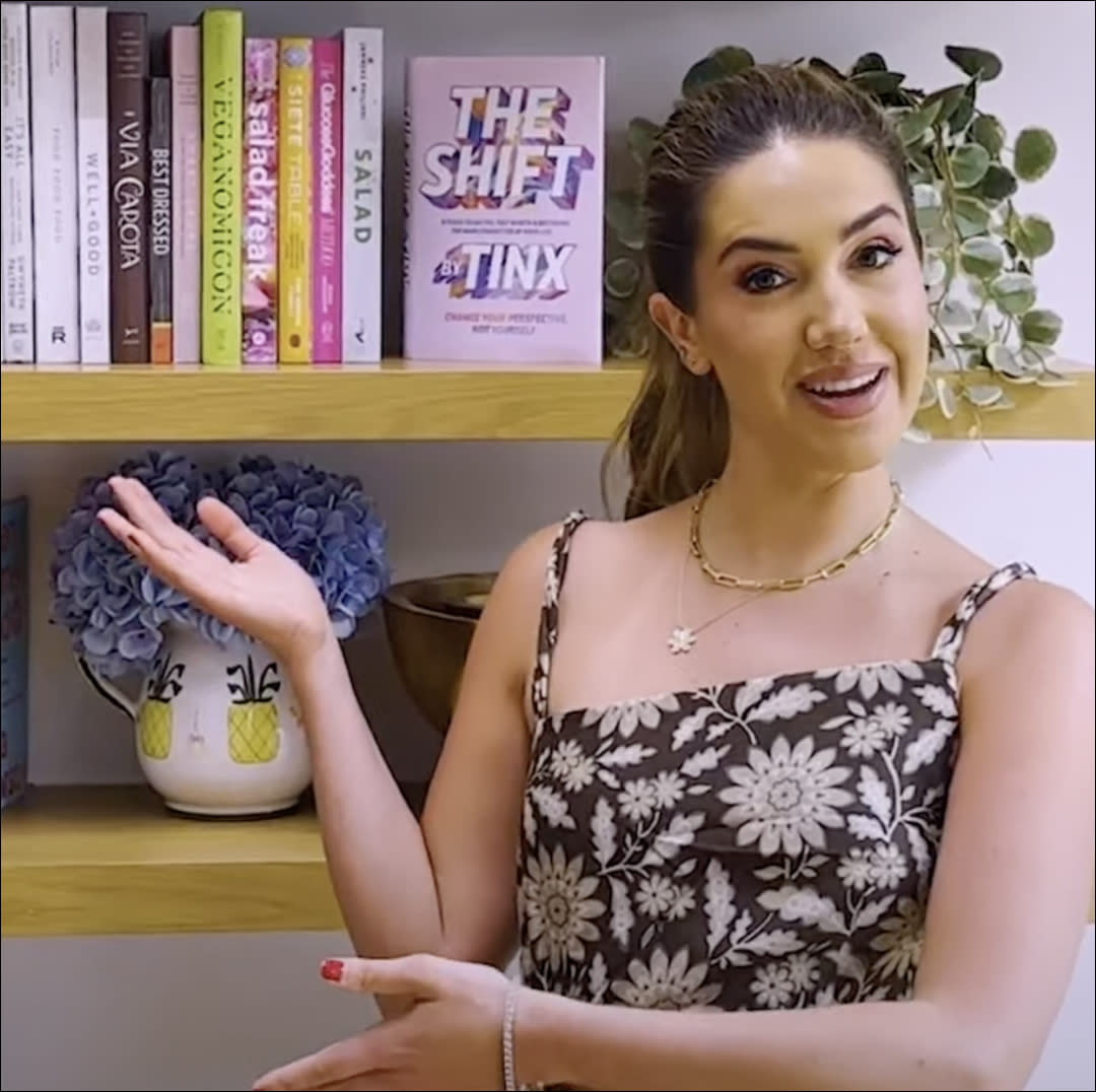  Christina Najjar (Tinx) showing off book her book shelf for Marie Claire's shelf portrait video  