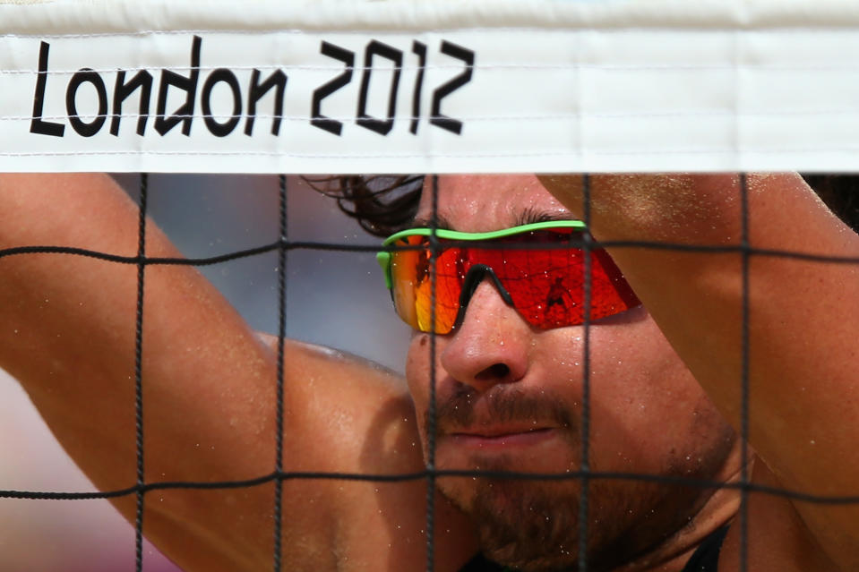 Jonathan Erdmann of Germany defends at the net during the Men's Beach Volleyball Round of 16 match between Brazil and Germany. (Getty Images)