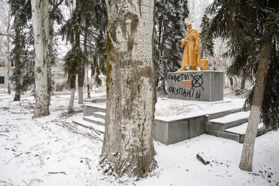 An inscription 'Soviet occupiers" is seen on the World War II memorial in Chasiv Yar, Donetsk Oblast, on Dec. 13, 2023. Chasiv Yar is located about 10 kilometers west of Bakhmut. (Dmytro Larin/Global Images Ukraine via Getty Images)