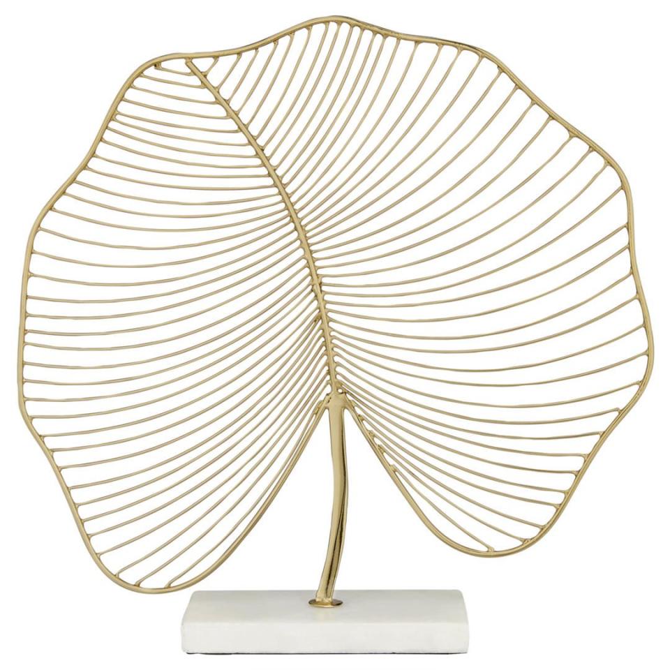 <p><a rel="nofollow noopener" href="https://www.johnlewis.com/john-lewis-wire-leaf-marble-base-ornament-gold/p3310552" target="_blank" data-ylk="slk:BUY NOW;elm:context_link;itc:0;sec:content-canvas" class="link ">BUY NOW</a> <strong>John Lewis, £25</strong></p><p>Perfect for a bookshelf or windowsill in a new home, this gold-finish leaf sculpture, handmade in India, is skilfully crafted from iron to achieve a fine and elegant shape. </p>