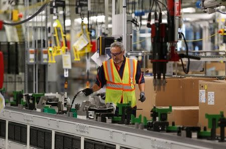 A Volvo employee works in the final assembly building at the first U.S. production plant in Ridgeville, South Carolina, U.S., June 20, 2018. REUTERS/Randall Hill