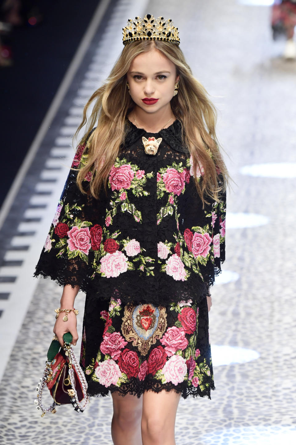 In one of her first jobs in 2017, Lady Amelia posed with a nod to her Royal roots wearing a crown at the Dolce & Gabbana show during Milan Fashion. (Getty Images)