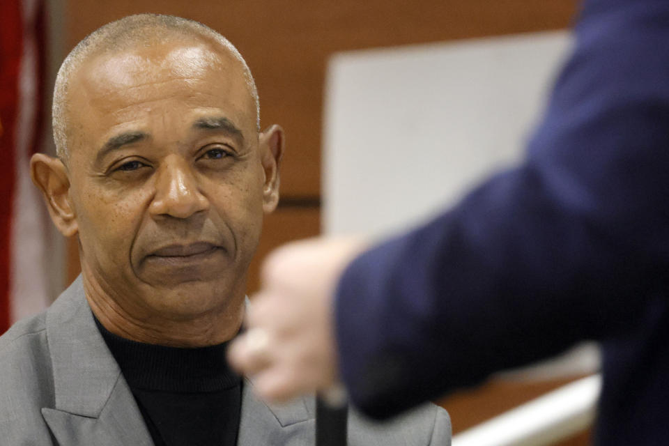 Former Marjory Stoneman Douglas Security Specialist Kelvin Greenleaf is shown a photograph as he testifies during the trial of former Marjory Stoneman Douglas High School School Resource Officer Scot Peterson at the Broward County Courthouse in Fort Lauderdale on Tuesday, June 20, 2023. Broward County prosecutors charged Peterson, a former Broward Sheriff's Office deputy, with criminal charges for failing to enter the 1200 Building at the school and confront the shooter as he perpetuated the Valentine's Day 2018 Massacre that left 17 dead and 17 injured. (Amy Beth Bennett/South Florida Sun-Sentinel via AP, Pool)