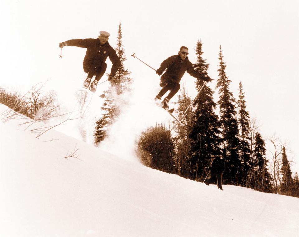 Earl Miller and Butch Hoffman jumping off School Hill at Snowbasin on Jan. 20, 1965. Hoffman became a certified ski instructor with the Earl Miller Ski School. | Courtesy photo