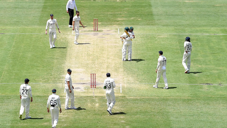 England players, pictured here looking on after Australia won the first Ashes Test.