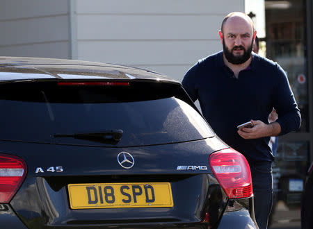 Simon Dowson is pictured as he walks to his car in Consett, Britain, September 30, 2016. REUTERS/Scott Heppell