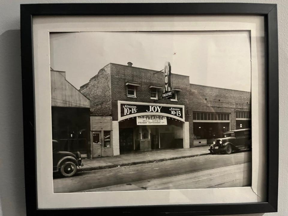 A photo of the Joy Theatre hangs inside Central Cinema.