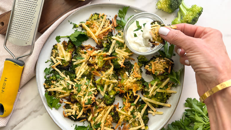 dipping broccoli in ranch