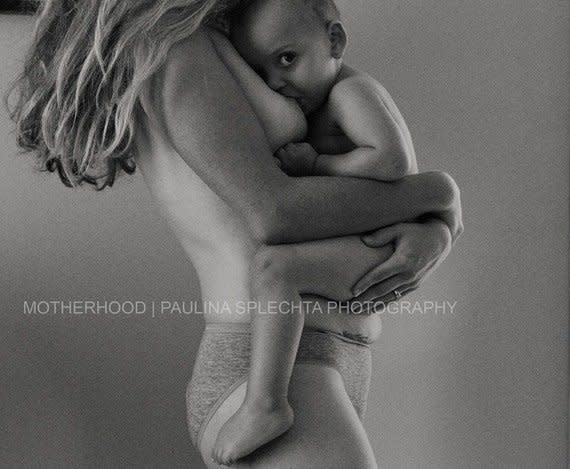 In a blog post where this image was featured, author Mama Bean writes, "We are continually sold The Ideal; the picture-perfect, fully-clothed, fully made-up portrait of Motherhood... And yet in the real world, motherhood takes a far more literal shape; a far more physical form. It may well be slim, trim and toned... just as it may be rounded, softened and stretched. And yet, this second and more common reality is hidden and censored by default, as if motherhood is somehow something to shelter from."<br><br>  <em><a href="http://www.huffingtonpost.com/mama-bean/stop-censoring-motherhood_b_6208150.html?utm_hp_ref=breastfeeding" target="_blank">Read the full post here.</a></em>