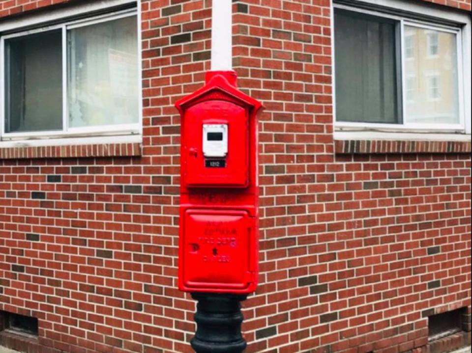 A red firebox in Boston. After 911 services went down across Massachusetts on Tuesday, the Boston Fire Department advised residents to use the boxes to alert firefighters to emergencies (Boston Fire Department)