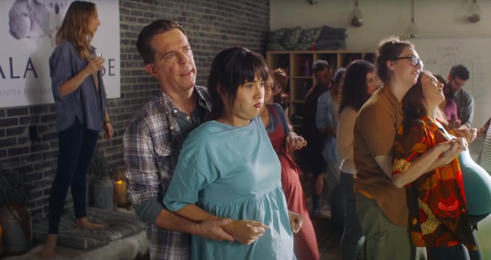 Ed Helms and Patti Harrison practice at a birthing class together