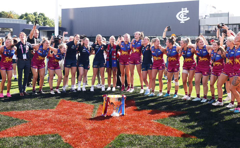 Brisbane Lions players, pictured here celebrating after winning the AFLW grand final.
