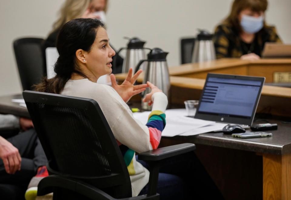 Springfield school member Maryam Mohammadkhani speaks during a meeting about a temporary mask mandate. She is the only board member who does not regularly wear a mask at meetings.