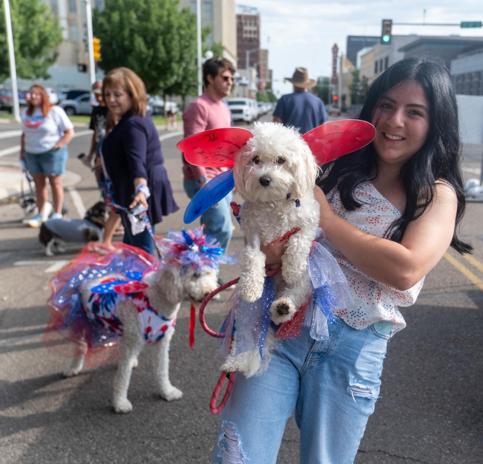 Jessica Lopez shows off her dog Coco at Center City's 3rd annual Patriotic Pet Parade Saturday at the Amarillo Community Market in downtown Amarillo.