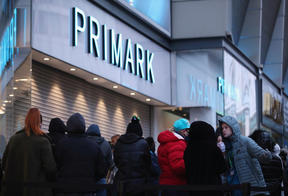 Customers queue to enter as retail store Primark in Birmingham, Britain reopens its doors after a third lockdown imposed in early January due to the ongoing coronavirus disease (COVID-19) pandemic, April 12, 2021. REUTERS/Carl Recine