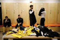 Betar Nordia Jerusalem players prepare for practice in their dressing room at the team's training ground in Jerusalem, January 24, 2018. REUTERS/Amir Cohen